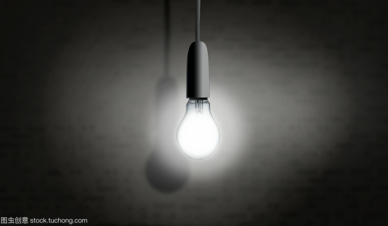 一个灯泡在黑暗中照明